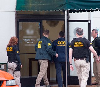 HHS and FBI agents walk into a business